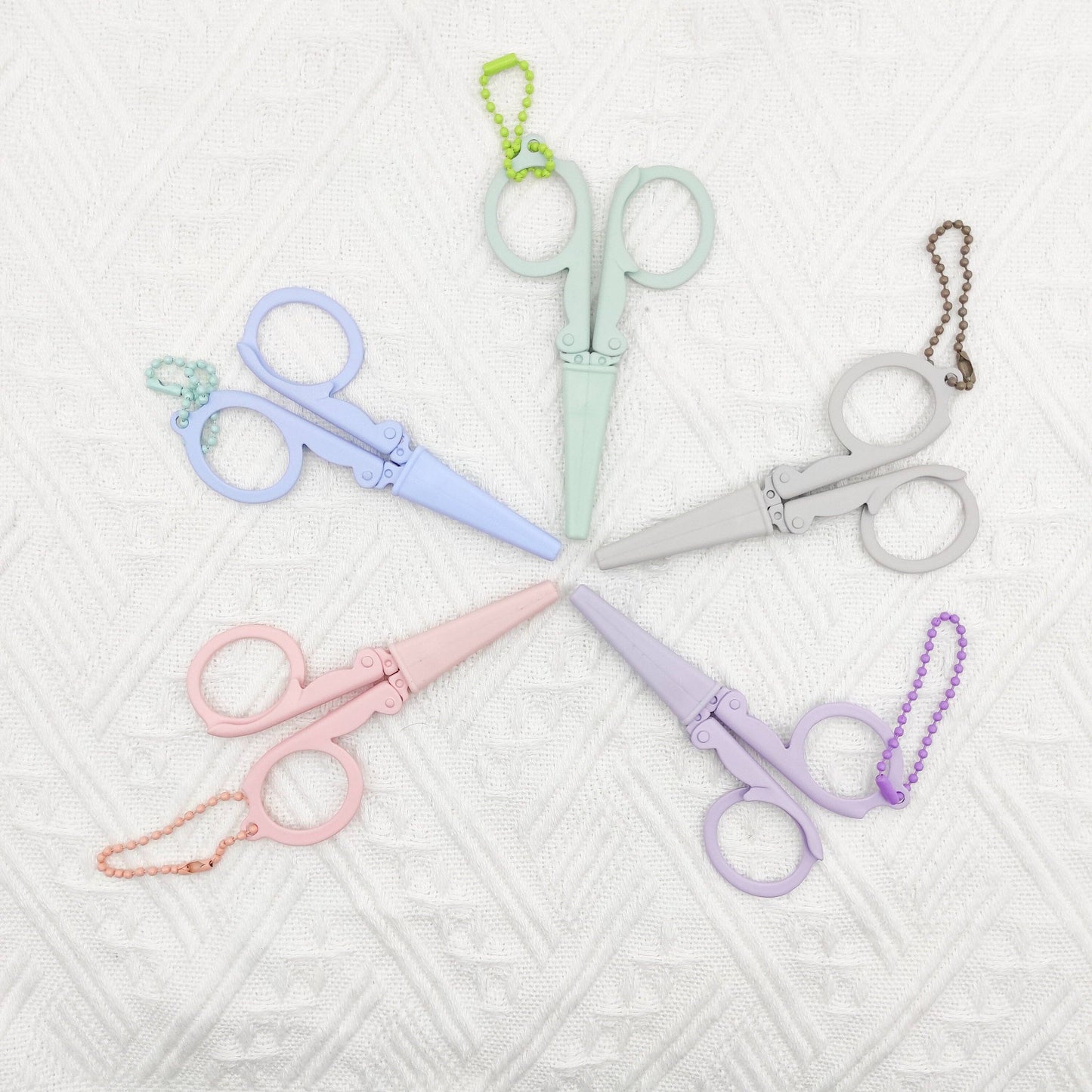 Portable folding scissors with sheath