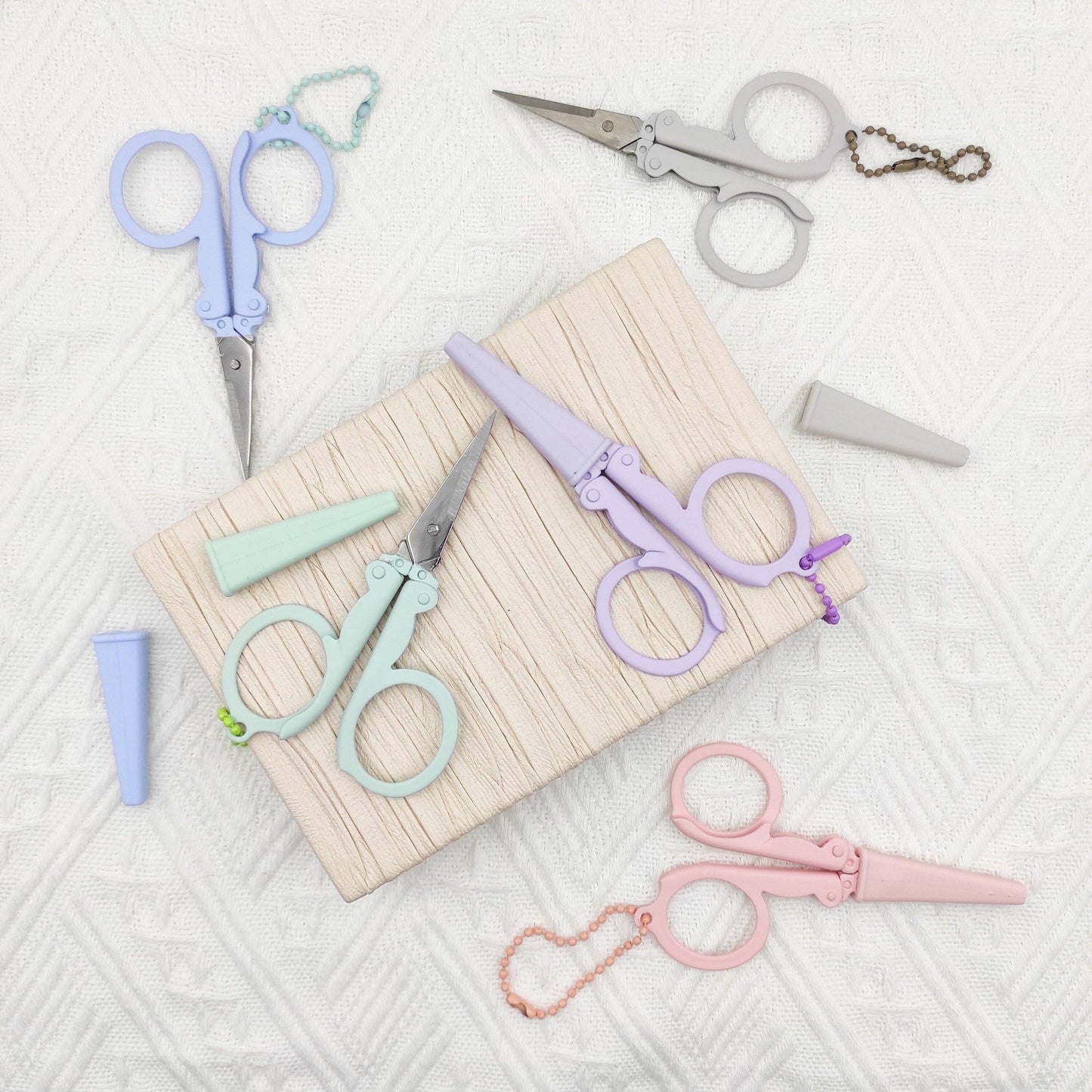 Portable folding scissors with sheath