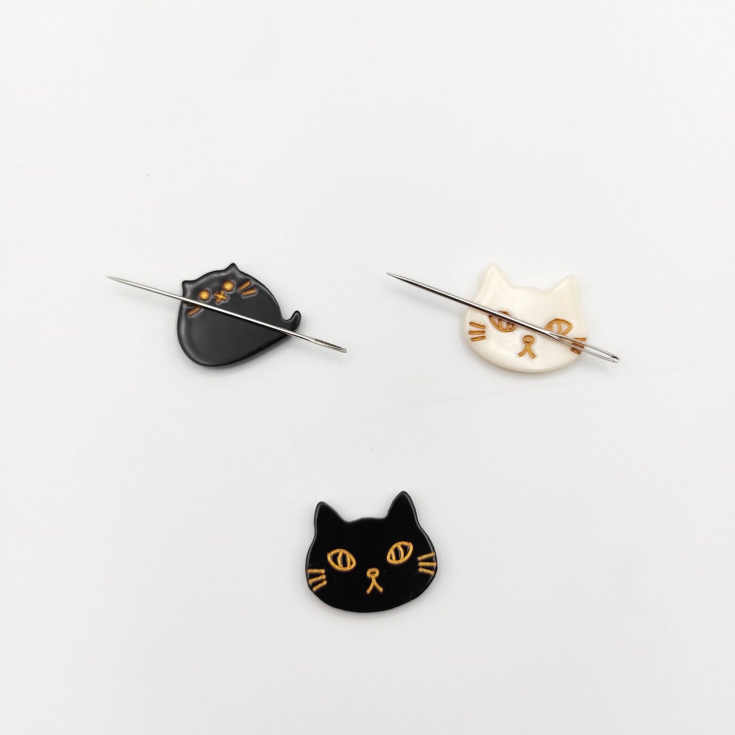 Cat needle minder